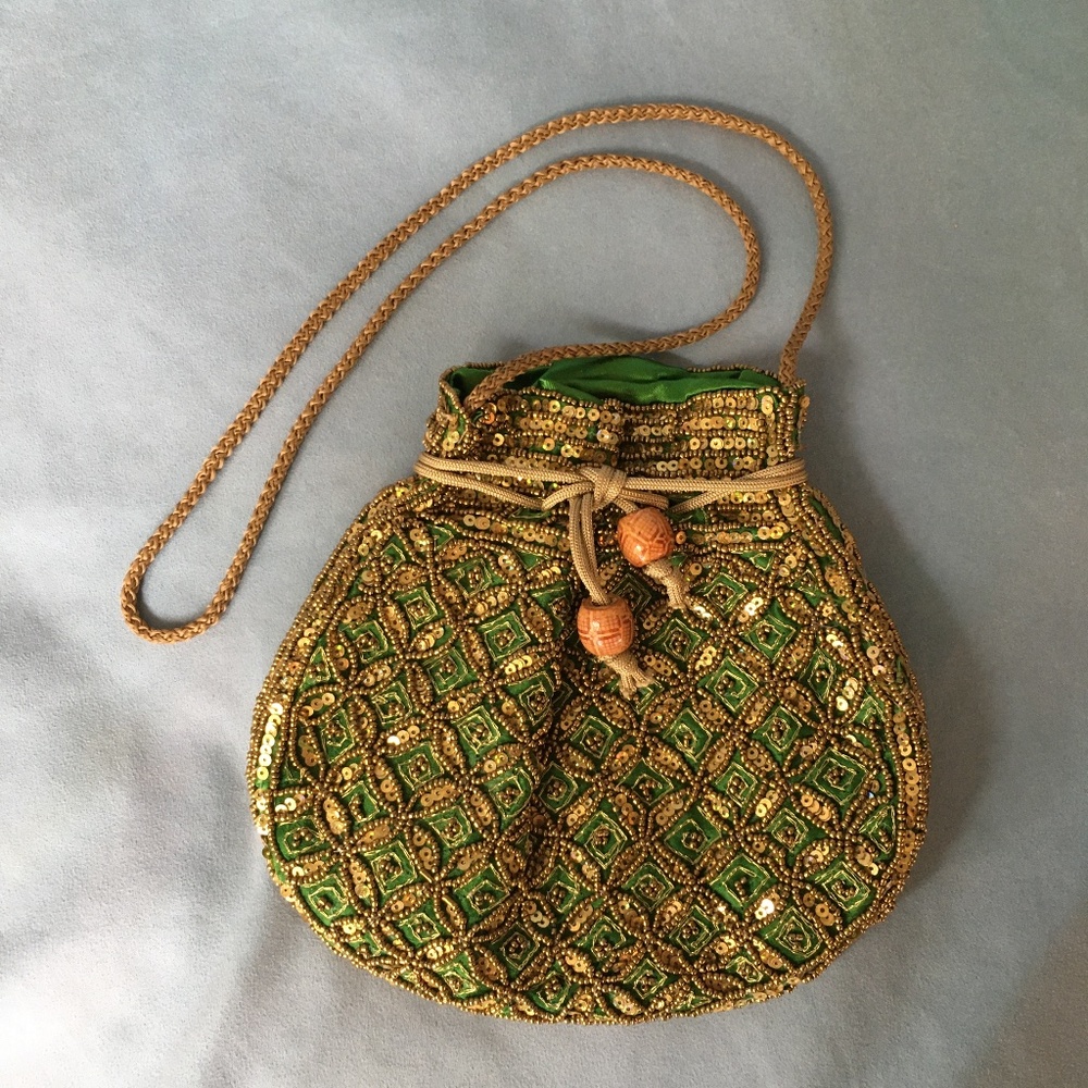 Beaded green satin/golden beads bag.
